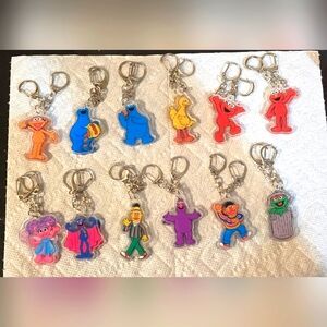 Set of 24 Sesame Street Characters Keychains.